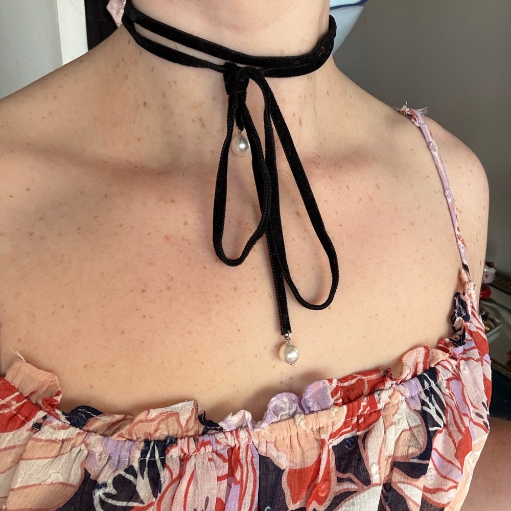 Black velvet wrap choker with faux pearls.